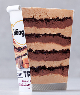 Pint of Haagen-Dazs trio salted caramel chocolate ice cream with inside view