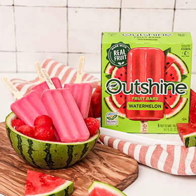 Outshine watermelon bars in a watermelon bowl