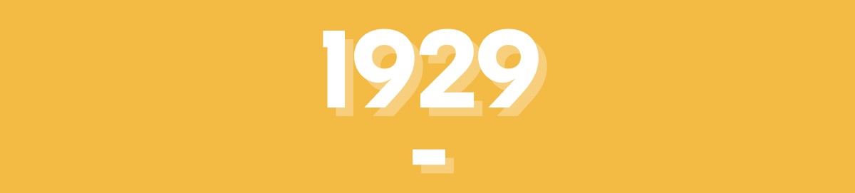 The year 1929 on a yellow banner