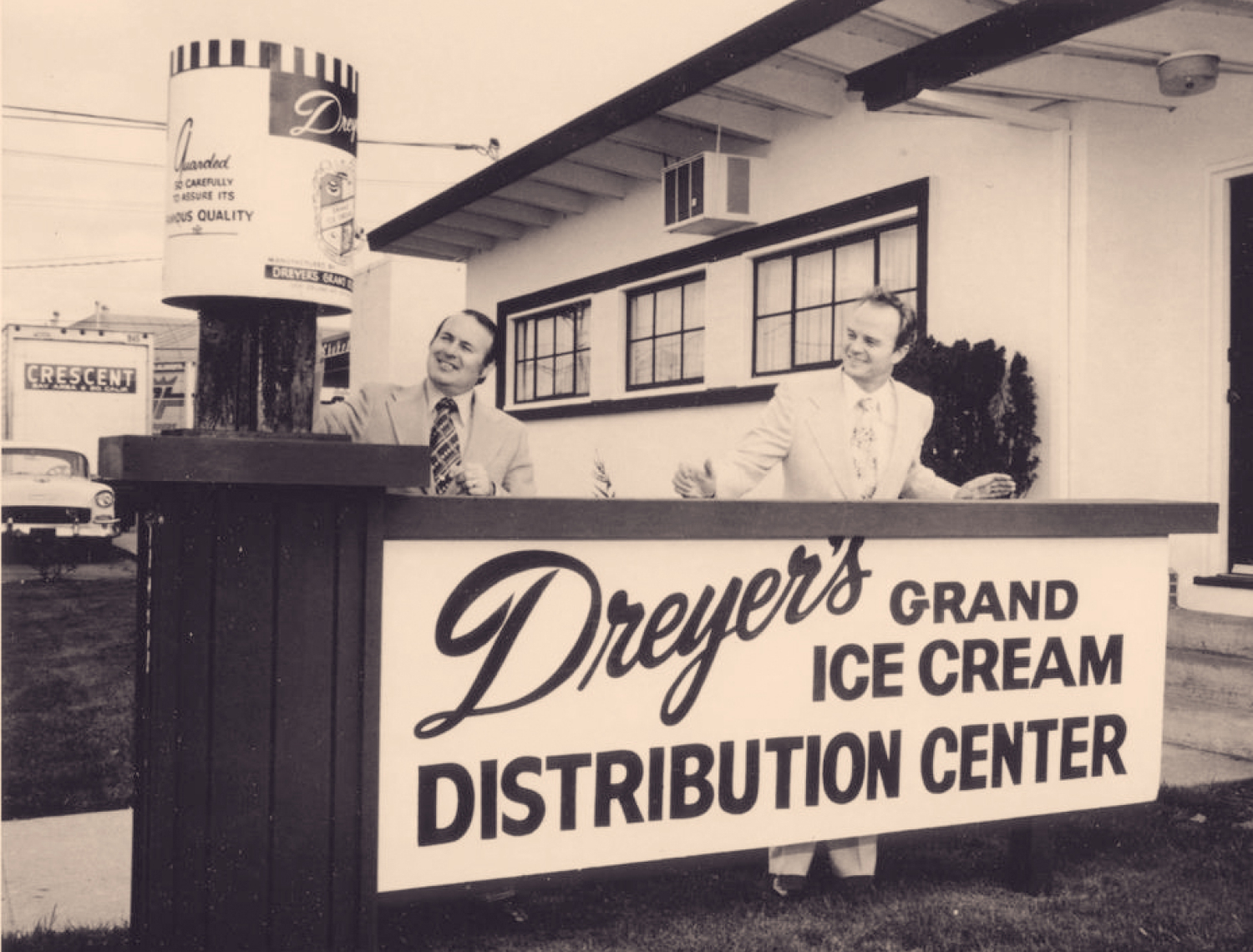 Black and white photo of the sign outside of Dreyer's Grand Ice Cream distribution center with the Dreyers.