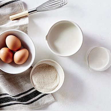 Ingredients to make ice cream in bowls