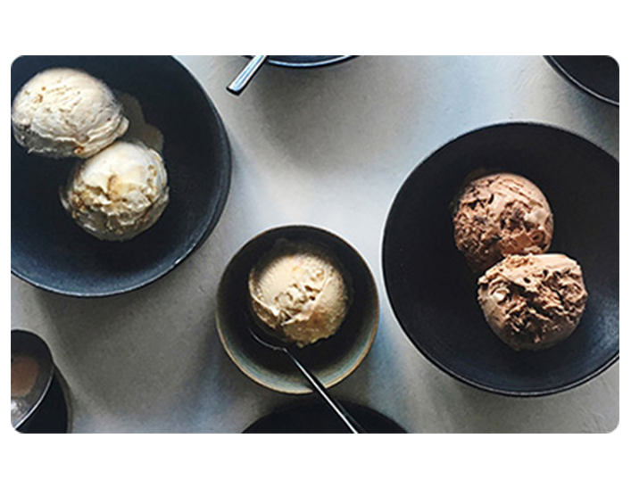 Three bowls with scoops of ice cream