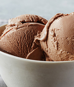 Scoops of Haagen-Dazs chocolate ice cream in a bowl