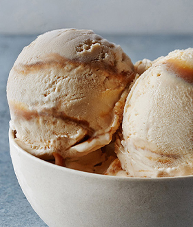 Scoops of Haagen-Dazs dulce de leche ice cream in a bowl