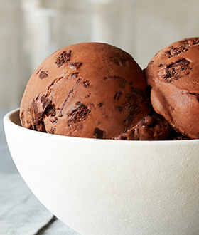 Scoops of Haagen-Dazs non dairy chocolate fudge salt truffle ice cream in a bowl