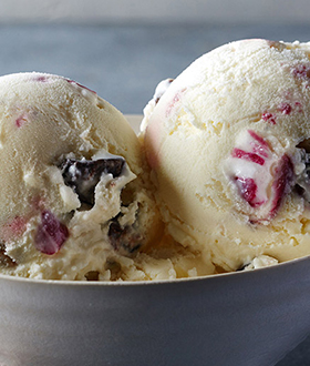 Scoops of Haagen-Dazs peppermint bark ice cream in a bowl