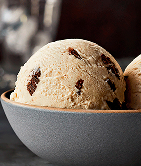 Scoops of Haagen-Dazs spirits  bourbon vanilla truffle ice cream in a bowl