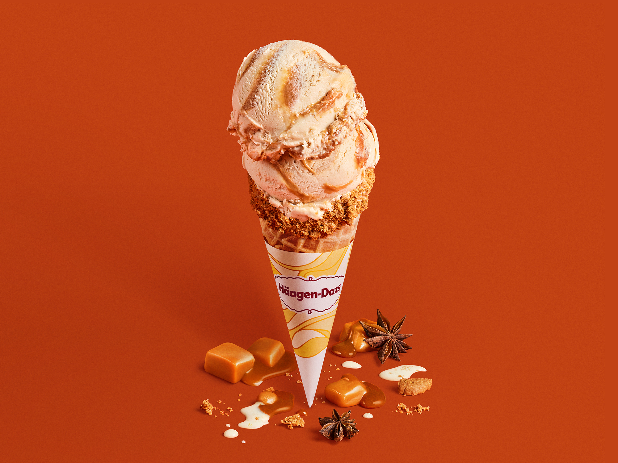 Pumpkin Spice Waffle Cone Fresh waffle cone dipped in white chocolaty chips and rolled in cinnamon cookie pieces and warm autumn spices.