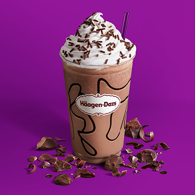 chocolate milkshake with whipped cream and chocolate sprinkles