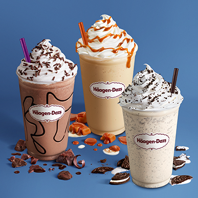 Image of chocolate milkshake, Dulce de leche milkshake, and a cookies and cream milkshake