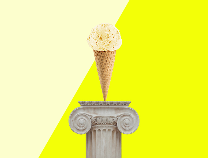 scoop of ice cream on a cone on a pedestal