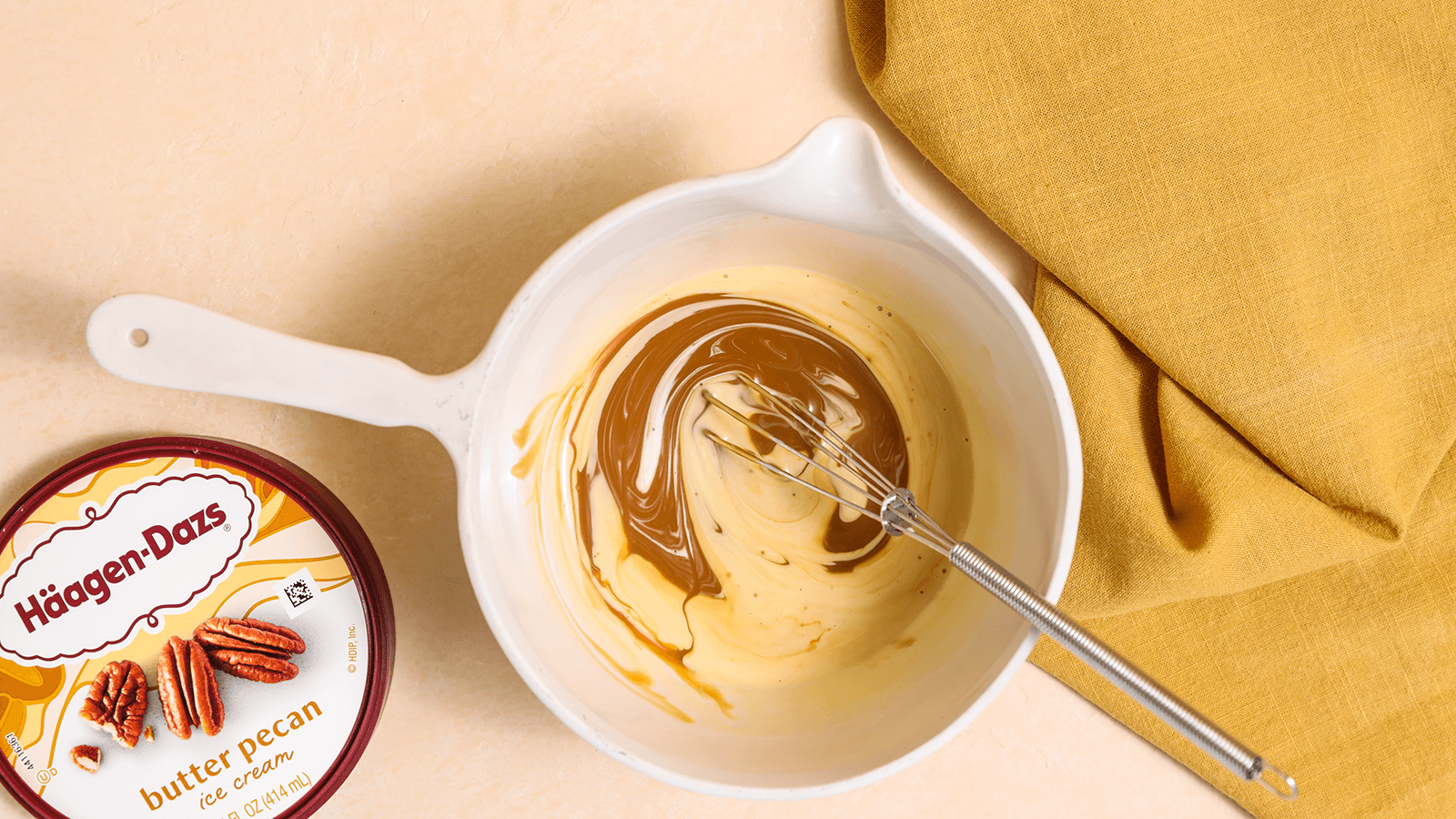 Mixing caramel with whisk in bowl