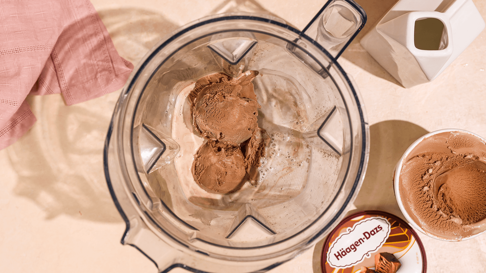 chocolate ice cream scoops in blender