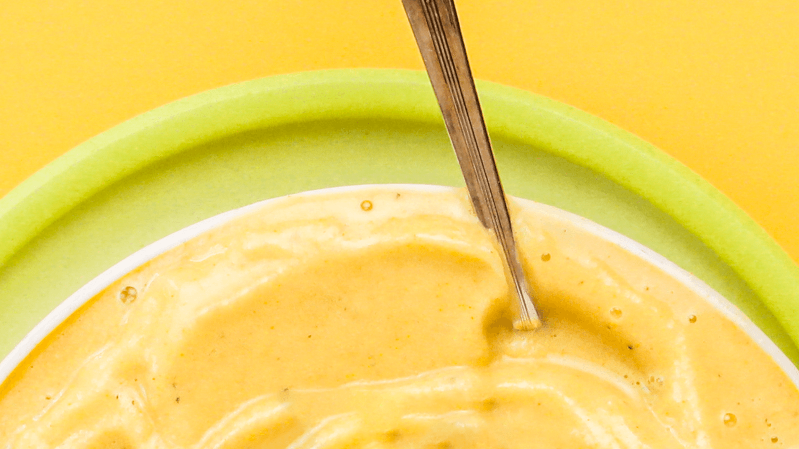 Scooping Turmeric Mango Smoothie 2