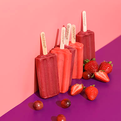 Outshine strawberry and grape fruit bars with fruit