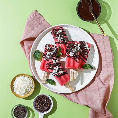 Outshine watermelon bars drizzled with chocolate