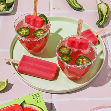 Glasses of Outshine spicy watermelon margaritas