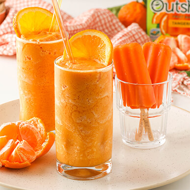 Outshine tangerine ginger turmeric smoothie with sliced tangerines