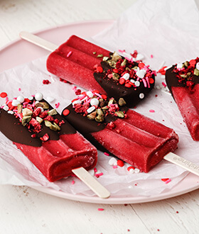Plate with Outshine raspberry chocolate dipped bars